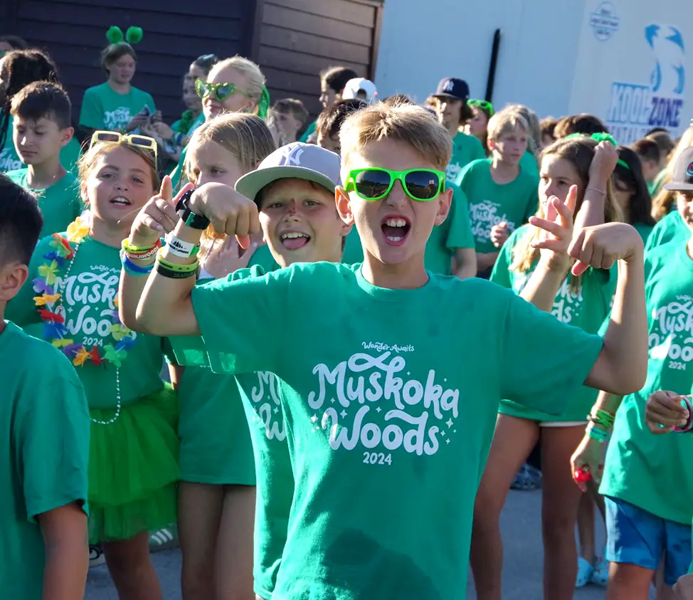 teenagers in green shirts