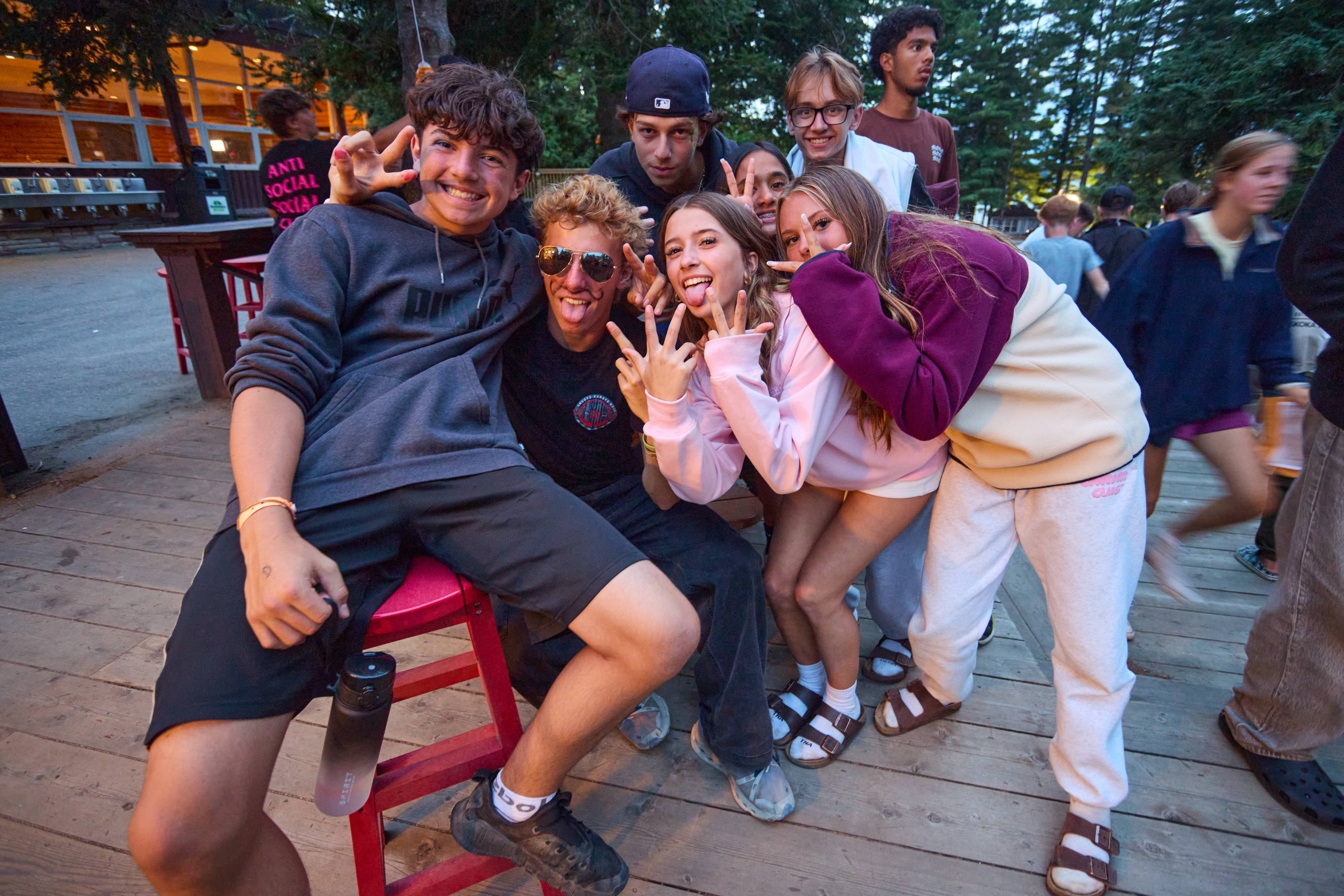 Teen summer camp guests pose for a photo during Class week at Muskoka Woods